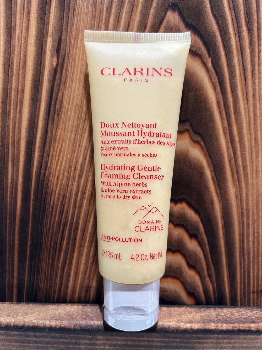 Clarins Hydrating Gentle Foaming Cleanser - Cream and Red Text